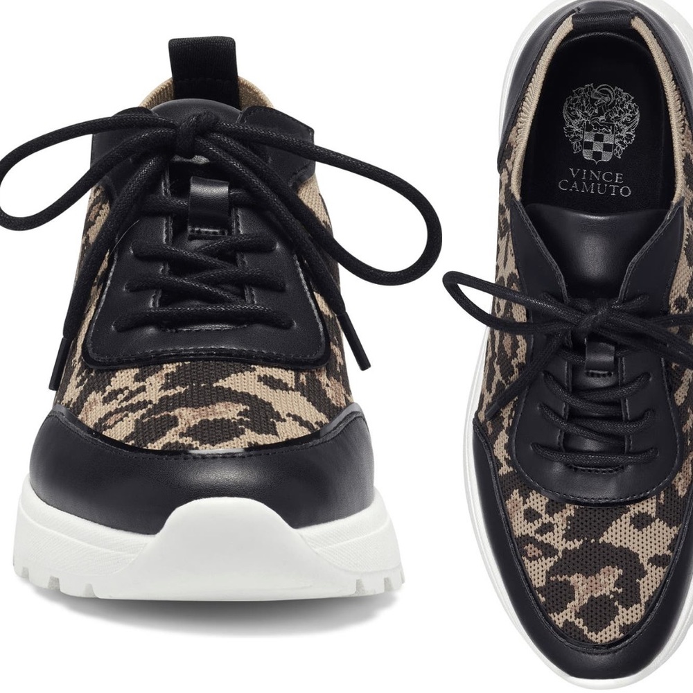 Size 6.5 Vince Camuto tennis shoes. Soft stretch material around ankle.